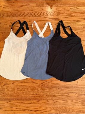 3 Nike Women’s Strappy Tank Tops – Black, Blue, White